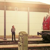 Mollhagen_Bahnhof_Haltestelle_1974_Raiffeisen_Eisenbahn_DB_Herbstmanover_Panzer_Entladung_Schurzenwagen_BR_221_V200-1