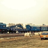 Bahnhof_Bad_Oldesloe_1975_Schleifzug_Gleiszug_Bahn_Bautrupp_gelb-5