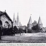 Lubeck_1860_LBE_alter_bahnhof_Holstentor_Marienkirche_Lubeck_Buchener_Eisenbahn_Gesellschaft